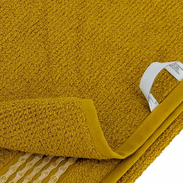 Drap de bain 100x150 cm pur coton INTENSE à bordures blanches couleur jaune